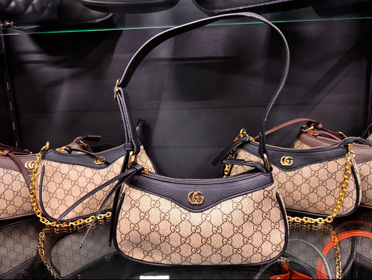 GUCCI Ophidia - Μαύρο Μπεζ διακοσμημένη με ανάγλυφη δερμάτινη επένδυση με εμπριμέ επικάλυψη και καμβά
GUCCI